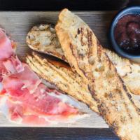 Prosciutto San Daniele · dry cured ham, sweet and slightly salty  (Italy)

served with house-made focaccia, pickled v...