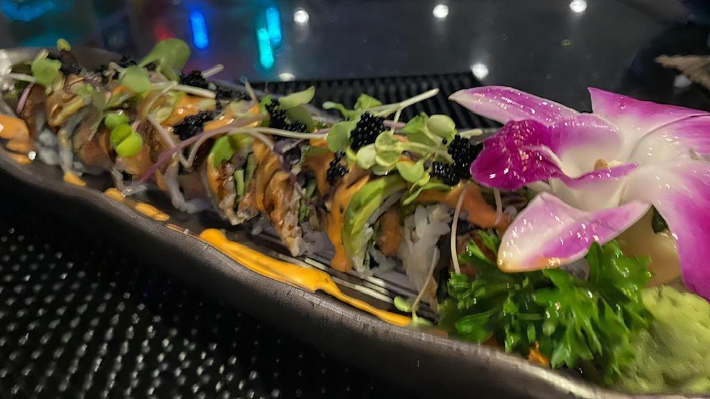 Black Dragon Maki (Spicy) · Spicy tuna and cucumber roll topped with eel, avocado, tobiko, unagi sauce and spicy mayo. Hot and spicy.
