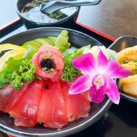 Sashimi Donburi (Tekka, Sake, Hamachi, Unagi) · 12 pieces of sashimi served over a bed of sushi rice with cucumber, avocado, seaweed salad. ...