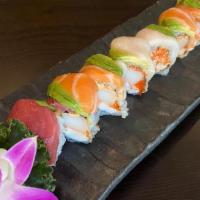 Rainbow Maki · Shrimp, crabmeat, tobiko and spicy mayo topped with assorted sashimi.