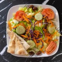 Garden · Pita bread, greek dressing, lettuce, tomato, cucumbers, black olives, carrots, red cabbage a...
