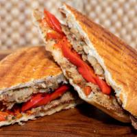 Eggplant Panini · Fried eggplant, roasted red peppers, grilled onion, provolone cheese, balsamic glaze, toaste...