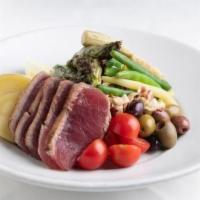 Tuna Nicoise* · seared tuna, little gem lettuce, fingerling potato, egg, artichoke, tomato, olives, green be...