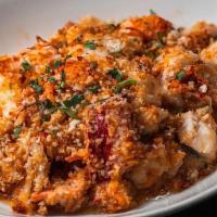 Maine Lobster Casserole · 2 lb shelled lobster, baked with breadcrumbs