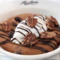 Skillet Cookie · warm chocolate chip cookie, chocolate sauce, candied pecans, vanilla ice cream