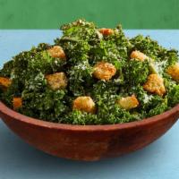 Kale Caesar Salad · Kale, parmesan cheese, and croutons with caesar dressing.
