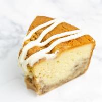 Sour Cream Coffee Cake · tender buttery crumb with a layer of pecan streusel inside and a buttermilk icing drizzle on...
