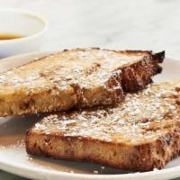 2 Slices Baked French Toast · fresh focaccia served with real maple syrup and powdered sugar