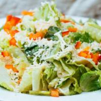 Caesar Salad · Romaine tossed with housemade caesar dressing, garlic croutons and parmesan.  See modifier s...