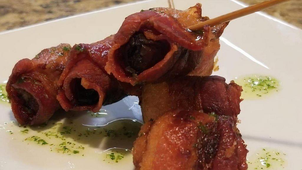Datiles · Dairy-free, peanut-free, tree nut-free, egg-free, shellfish-free, gluten-free, fish-free, soy-free. Bacon wrapped dates stuffed with white cheddar cheese.