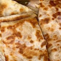 Chicken Quesadilla  · tree-nut-free, shellfish-free, soy-free
Allergens dairy. Flour Tortilla with Grilled Chicken...