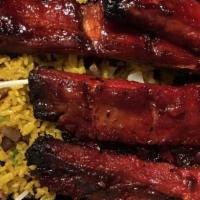 Bar B Q Spare Ribs · Ribs that have been broiled roasted or grilled.