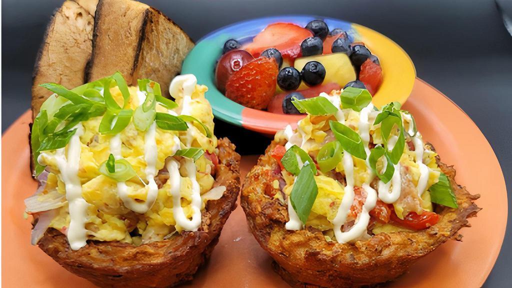 Hash Quiche · Two crispy fried hash brown bowls stuffed with scrambled eggs, bacon, roasted red peppers, onions & jalapeno-jack cheese. Topped with sour cream & scallions. Served with fresh fruit salad & toast.