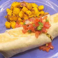 Breakfast Burrito · A flour tortilla filled with scrambled eggs, black beans, Cheddar cheese, fire roasted pobla...