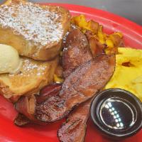 French Toast Monster · Two pancakes or two French Toast topped with powdered sugar & whipped butter. Served with tw...