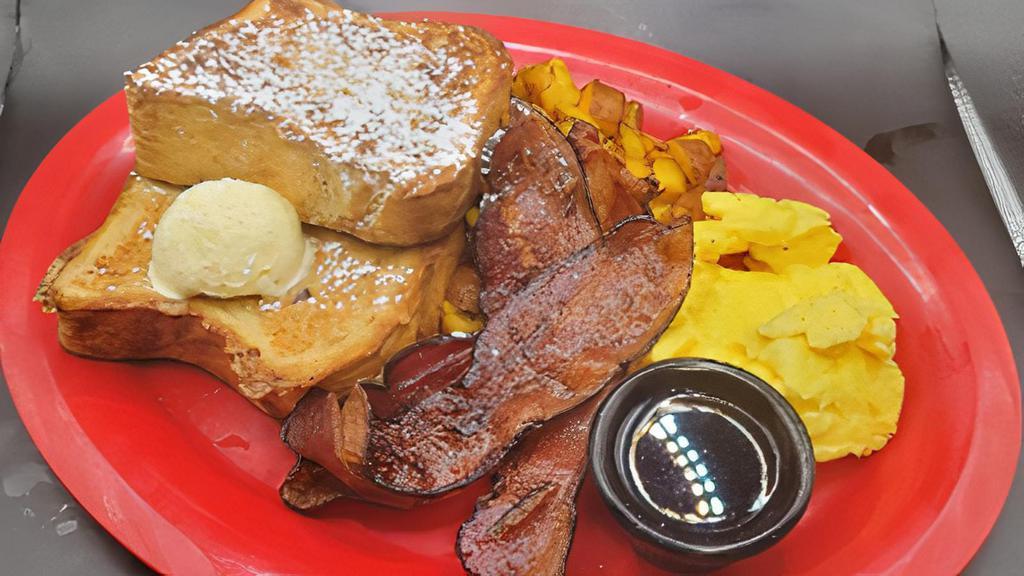 French Toast Monster · Two pancakes or two French Toast topped with powdered sugar & whipped butter. Served with two eggs any style, home fries & your choice of breakfast meat.