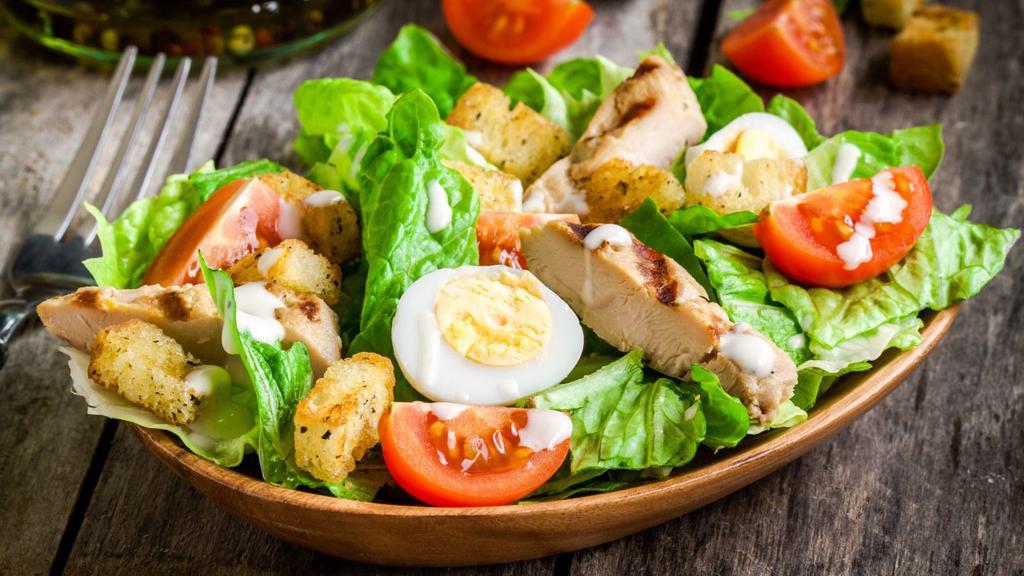 Hard Boiled Egg Salad · Crisp lettuce salad with two hard boiled eggs, black olives, croutons, cucumbers, green peppers, mushrooms, onions, sweet peppers and juicy tomatoes.