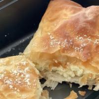 Tiropita · A blend of Greek cheese, wrapped in filo dough and oven baked (cheese pie).
