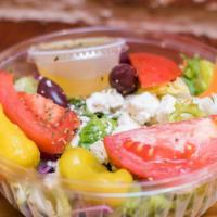Greek Salad · Lettuce, tomato, pepperoncini peppers, kalamata olives and feta cheese. Served with a side o...