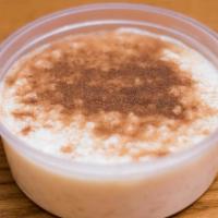 Rice Pudding · classic Greek rice pudding, topped with cinnamon.