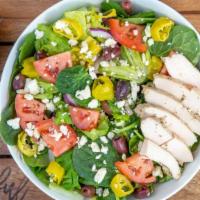 Greek Salad (Traditional Or Add Chicken) · A mix of Green leaf lettuce with Baby Spinach, Red Onion, Kalamata Olives, Feta Cheese, Toma...