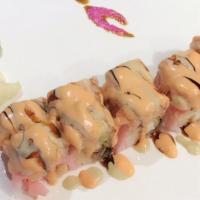Lobster Rock Roll · Shrimp tempura,eel avocado inside wrapped with pink soy paper top with lobster salad&chef's ...