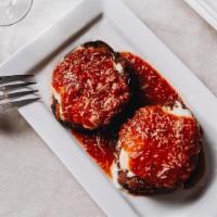 Eggplant Parmigiana Family Style · San marzano tomato sauce and mozzarella
