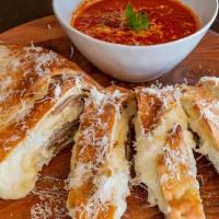 Meatball Calzone · meatball, grande ricotta, mozzarella, side of marinara