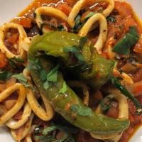 Calamari Siciliani · sauteed calamari tossed with capers, kalamata olives, fresh tomatoes, long hots