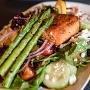Insalata Di Salmon · grilled wester ross salmon, mixed greens, asparagus, red onion, cherry tomato, cucumbers, go...