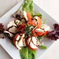 House Salad · Gluten-Free. Fresh mixed greens, cherry tomatoes, red onion, and cucumber with balsamic vina...