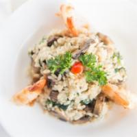 Risotto · Risotto cooked in mushroom or spinach.