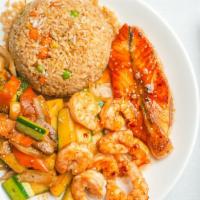 Hibachi Shrimp · Served with clear soup green salad 2 pieces shrimp vegetable and fried rice.