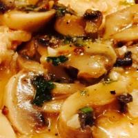Chicken Marsala · Served with a side of linguine and marinara sauce.