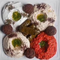 Sampler · Vegetarian Item. Hummus, Baba ghanouj, tzatziki, beets or mohammara, four falafels and four ...