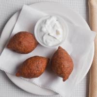 Fried Kibbeh · Homemade Authentic Syrian Fried Kibbeh. Served as cracked wheat stuffed with ground beef, on...