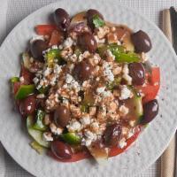 Greek Salad · Vegetarian Item. Romaine lettuce, tomatos, cucumber, green bell peppers, red onions, kalamat...