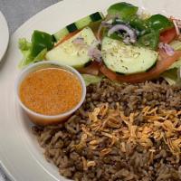 Mujadara · Vegetarian Item. Lentil rice garnished with caramelized onions, served with a house salad an...