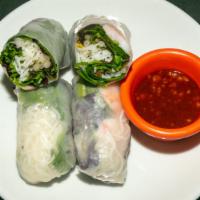 Fresh Summer Rolls · Mixed greens, rice noodles, bean sprouts, fresh herbs.  Served with a spicy peanut sauce.