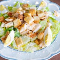 Caesar Salad · With romaine lettuce, croutons, eggs and parmesan cheese. Served with garlic bread.