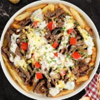 Philly Lily Loaded Fries · Steak, caramelized onions, bell peppers, and melted cheese topped on Idaho potato fries.