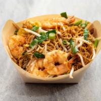 Shrimp Stir-Fry · Stir fried vegetables topped with shrimp with chow mein or udon noodles.