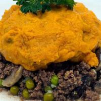 Shepherd'S Pie · Seasoned ground beef sauteed with mushrooms and peas. Topped with our sweet mashed potato! S...