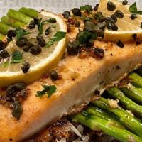 Lemon Caper Salmon · Lemon Caper Salmon

Wild Salmon baked and topped with our own fresh garlic, lemon caper
sauc...