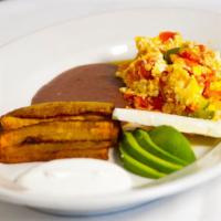 Típico Desayuno Salvadoreño · Salvadorean Breakfast: Two scrambled eggs mixed with tomatoes, bell peppers and onions; serv...