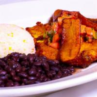 Milanesa De Pollo · Fried breaded breast of chicken with black beans, fried plantains and pico de gallo.
