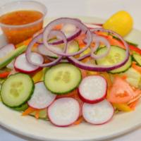 Ensalada Rinconcito / House Salad · Chopped lettuce, avocado, radish, cucumbers, tomatoes, sweet peppers, and sautéed onions. Ch...