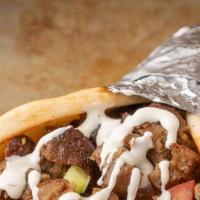 Lamb Gyro · Cooked on a spit and wrapped in a pita.