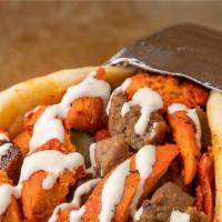 Combo Gyro · Chicken and lamb. Cooked on a spit and wrapped in a pita.