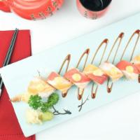 Sex On The Beach Roll · Raw. Shrimp tempura, crab avocado inside topped with salmon, tuna, soy paper, spicy mayo and...